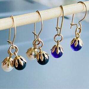 2 Pairs of 14k Gold Earrings With Interchangeable Charms Pearl, Onyx, Am…